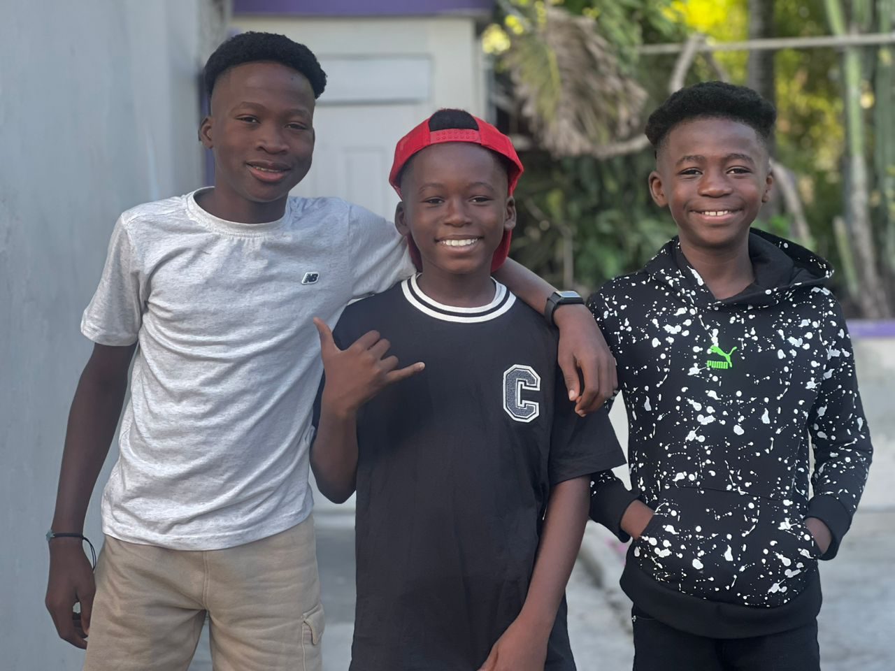 Three boys from the Rév Home in Haiti