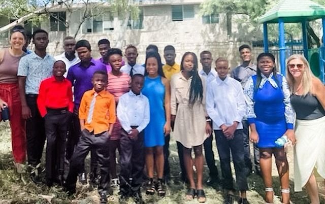 Children, youth, and staff of the Rév Home in Haiti